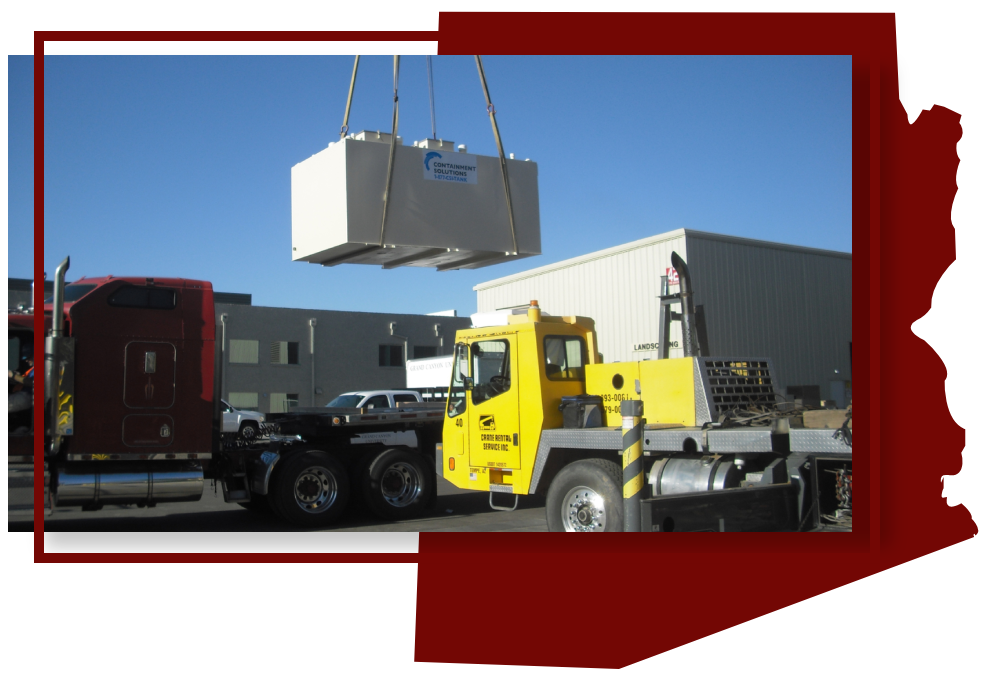 A crane lifting a truck with a box on top.